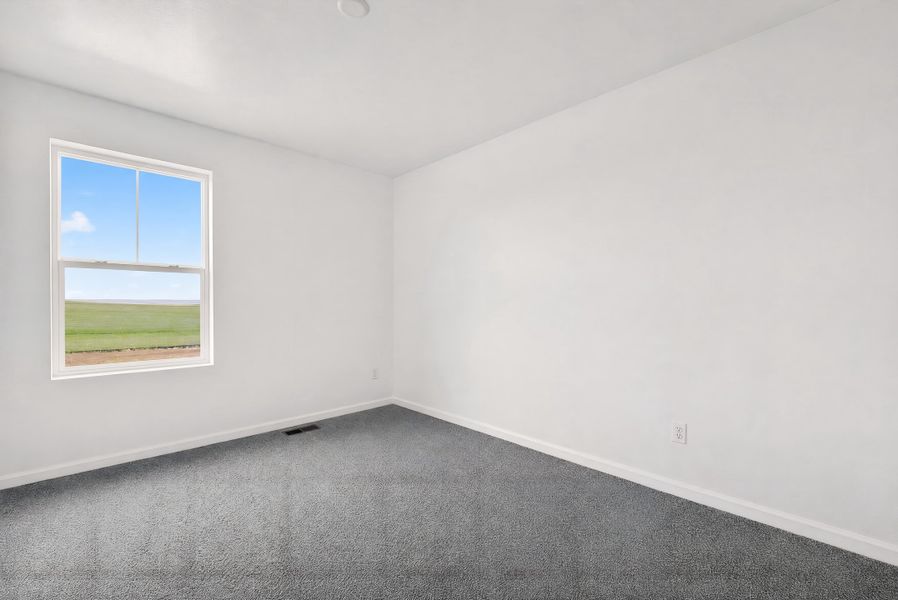 Spacious, unfurnished interior of a new home in Sky Ranch, Watkins (Image 15).