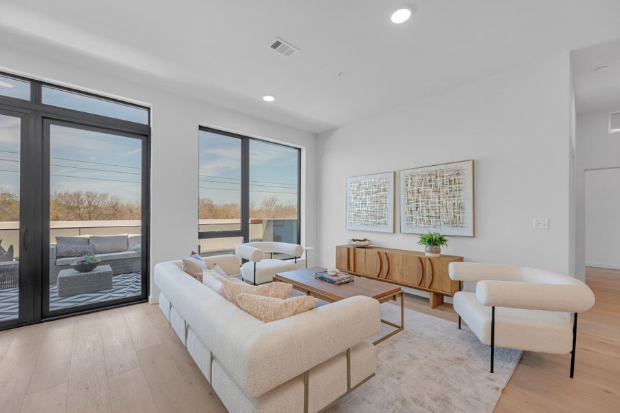 Furnished interior view inside a new home in One Oak, Austin (Image 6).