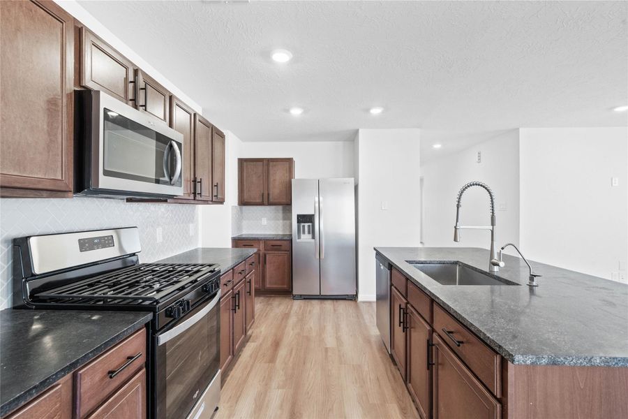 Furnished interior view inside a new home in Olympia Falls, Fresno (Image 8). Furnished interior view inside a new home in Olympia Falls, Fresno (Image 8).