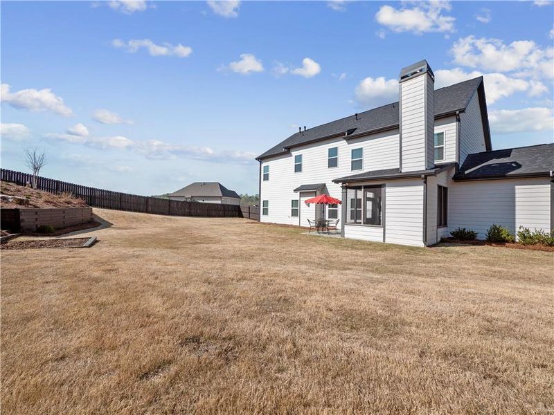 Exterior details and patio area of a home in , Hoschton (Image 32).