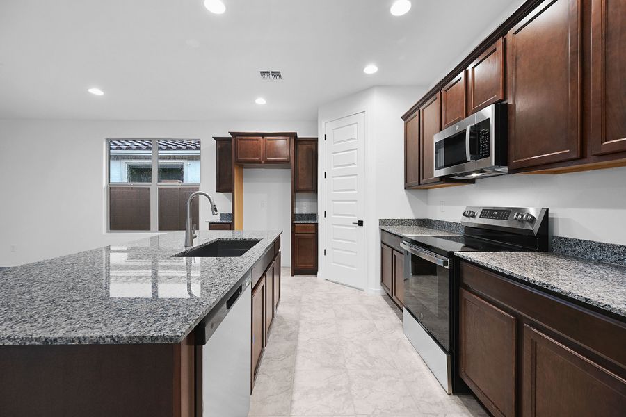 Representative furnished interior of a home built from the Origin by Taylor Morrison in Artisan at Asante Encore Collection, Surprise (Image 6). Representative furnished interior of a home built from the Origin by Taylor Morrison in Artisan at Asante Encore Collection, Surprise (Image 6).