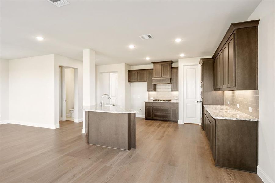 Furnished interior view inside a new home in Creekview Meadows, Pilot Point (Image 9).