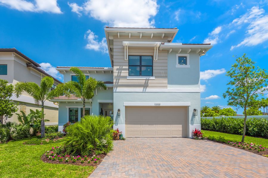 Representative exterior photo of a completed home built from the Orion by GL Homes in Apex at Avenir, Palm Beach Gardens, FL (Image 1). Representative exterior photo of a completed home built from the Orion by GL Homes in Apex at Avenir, Palm Beach Gardens, FL (Image 1).