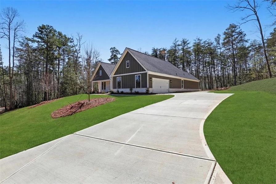 Front exterior of a new home in , Clarkesville, GA, highlighting curb appeal (Image 30). Front exterior of a new home in , Clarkesville, GA, highlighting curb appeal (Image 30).