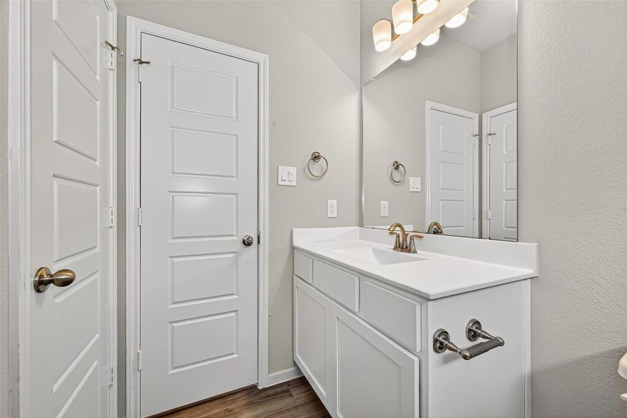 Furnished interior view inside a new home in Sunterra, Katy (Image 10).