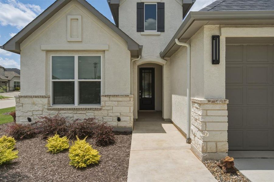 Exterior details and patio area of a home in , Denton (Image 3).