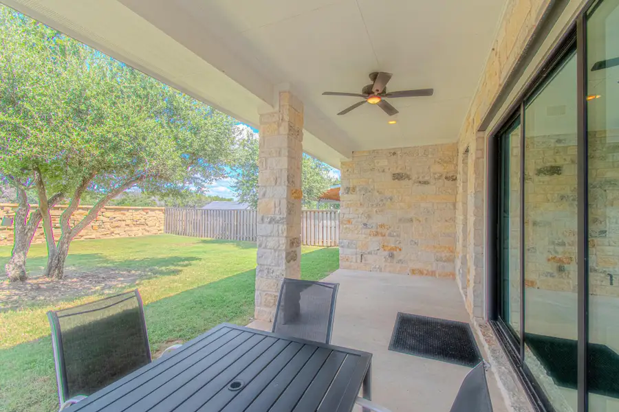 The backyard is ready for your personal touch and includes a large covered patio ideal for relaxing or entertaining. A gas grill connection is also available!