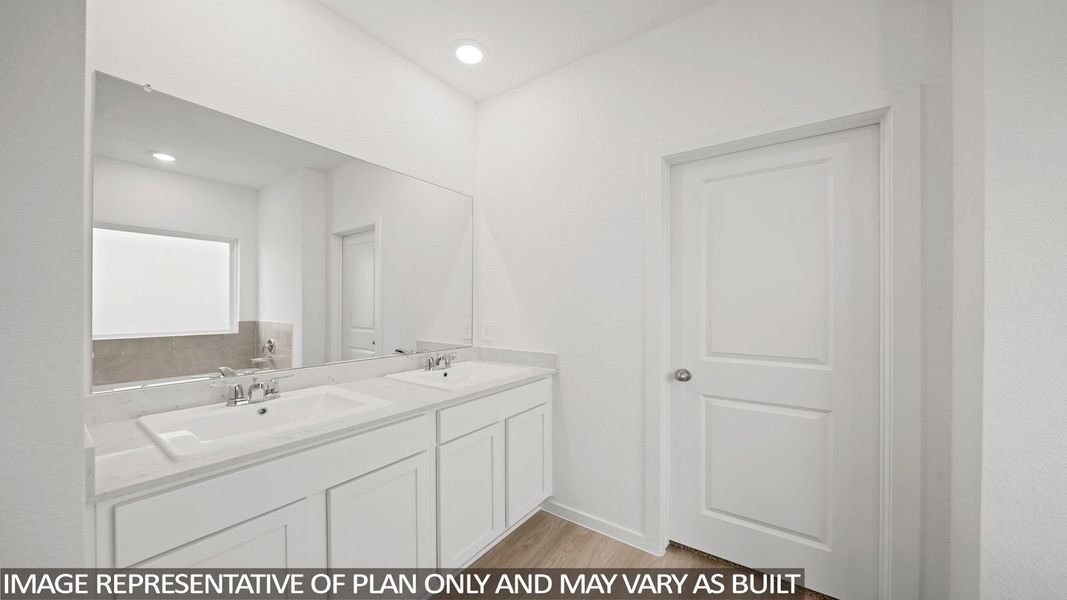 Representative furnished interior of a home built from the Kendall by D.R. Horton in Sunterra Lakes, Brookshire (Image 10).
