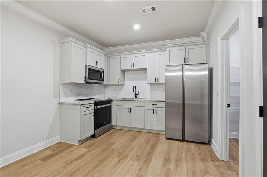 Furnished interior view inside a new home in , Dacula (Image 37).