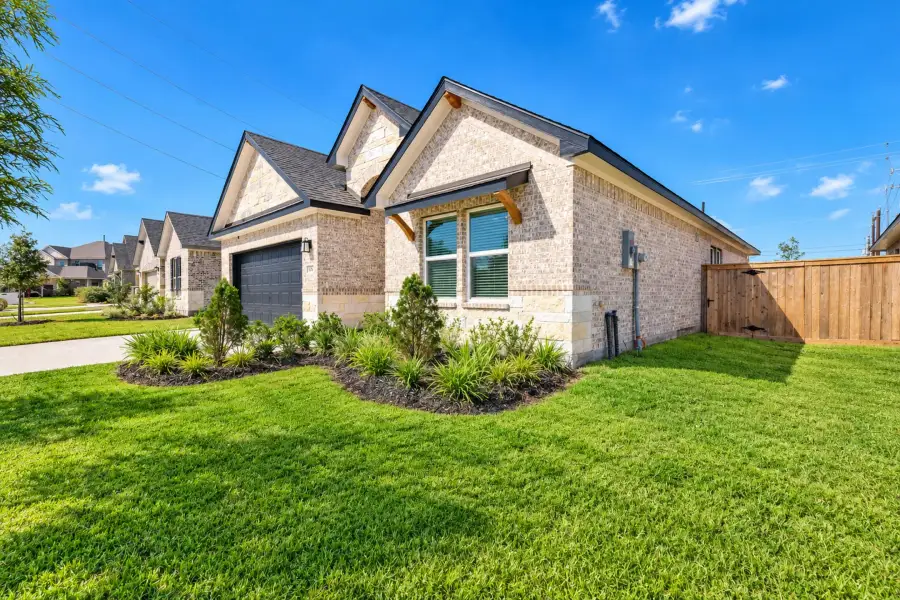 Front exterior of a new home in Ashland, Houston, TX, highlighting curb appeal (Image 19). Front exterior of a new home in Ashland, Houston, TX, highlighting curb appeal (Image 19).
