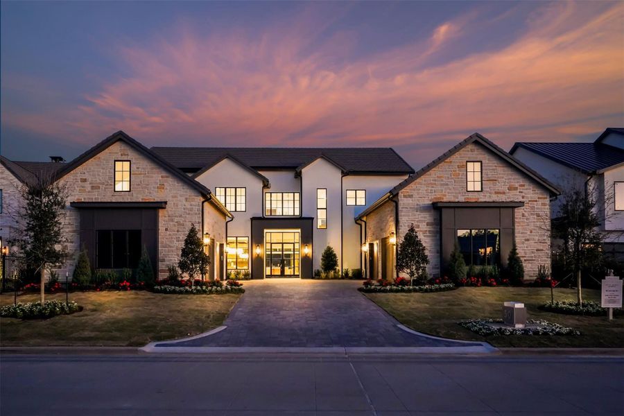 A beautifully-lit facade, stone accents, and west facing front door that's enhanced by immaculate landscaping. A beautifully-lit facade, stone accents, and west facing front door that's enhanced by immaculate landscaping.