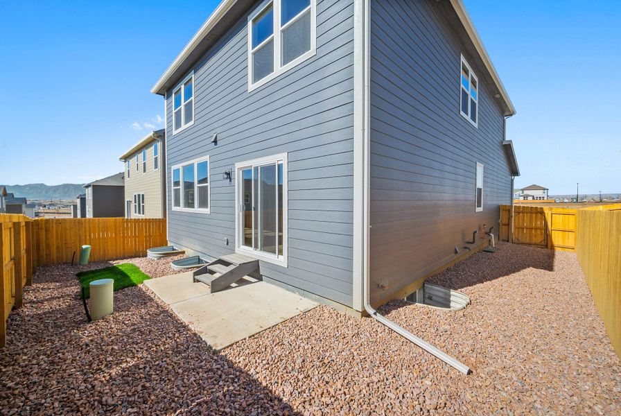 Exterior details and patio area of a home in Ridge at Lorson Ranch, Colorado Springs (Image 20). Exterior details and patio area of a home in Ridge at Lorson Ranch, Colorado Springs (Image 20).