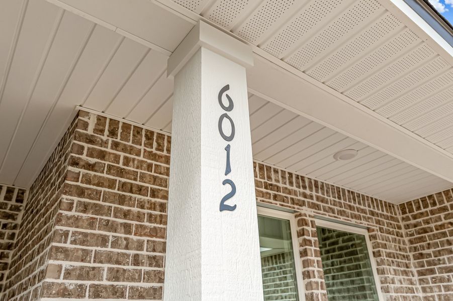 Exterior details and patio area of a home in Southern Day Chateau, Baker (Image 27).