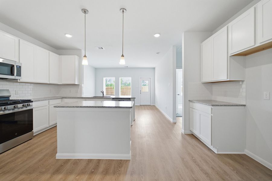 Furnished interior view inside a new home in The Pines at Seven Coves, Willis (Image 14).