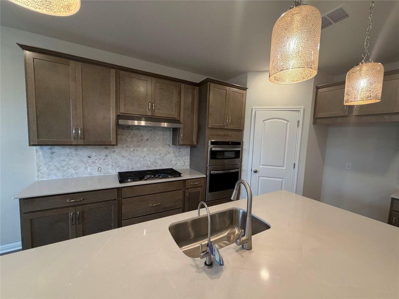 Furnished interior view inside a new home in Cannon Ranch, Dripping Springs (Image 5).