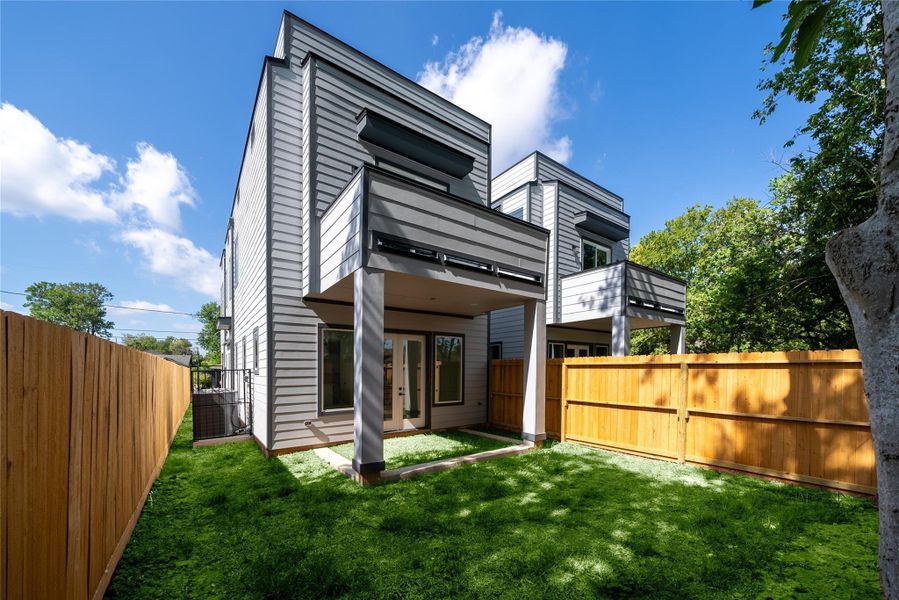 Private back yard with covered space for cookouts, relaxation or entertaining.