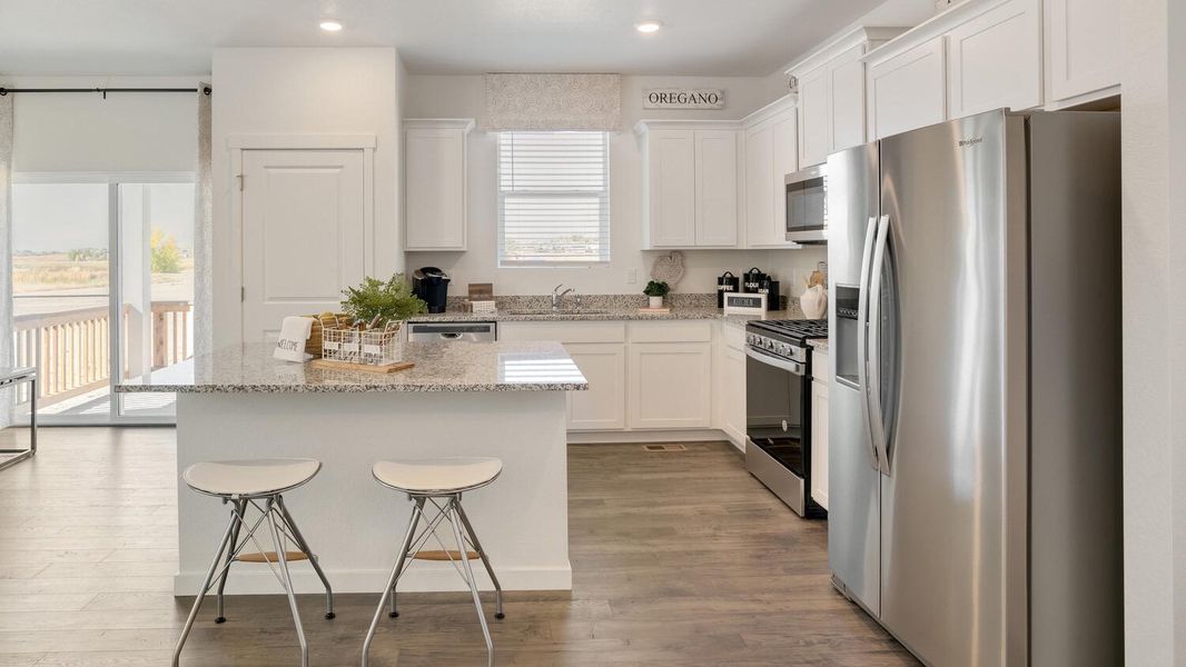 Furnished interior view inside a new home in The Ridge at Lorson Ranch, Colorado Springs (Image 8).