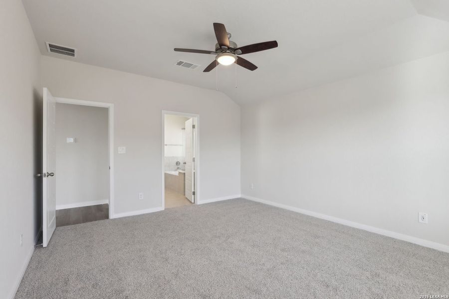 Spacious, unfurnished interior of a new home in Legendary Trails - Classic Series, Cibolo (Image 36).