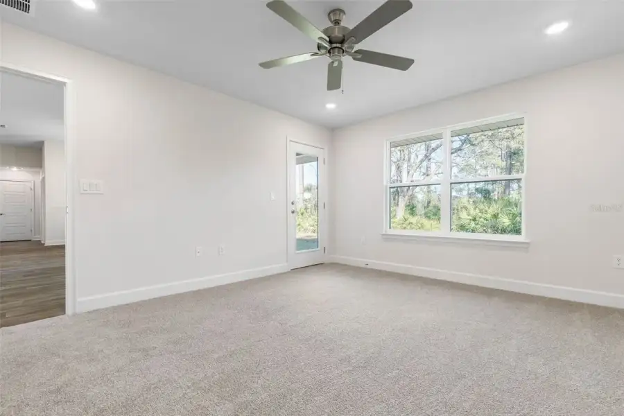 Representative unfurnished interior of a home built from the 2265 by Adams Homes in Flagler Estates, Hastings (Image 45).