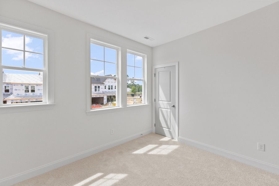 Representative unfurnished interior of a home built from the The Hemlock by RobuckHomes in Kennebec Crossing, Angier (Image 140).