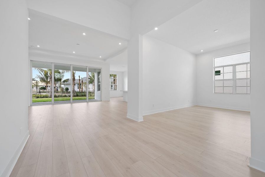 Spacious, unfurnished interior of a new home in L'Ambiance at Avenir, Palm Beach Gardens (Image 32).