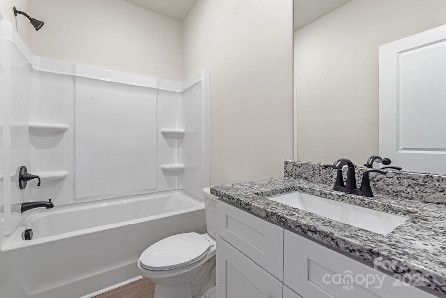 Furnished interior view inside a new home in Ascot Woods, Charlotte (Image 12).