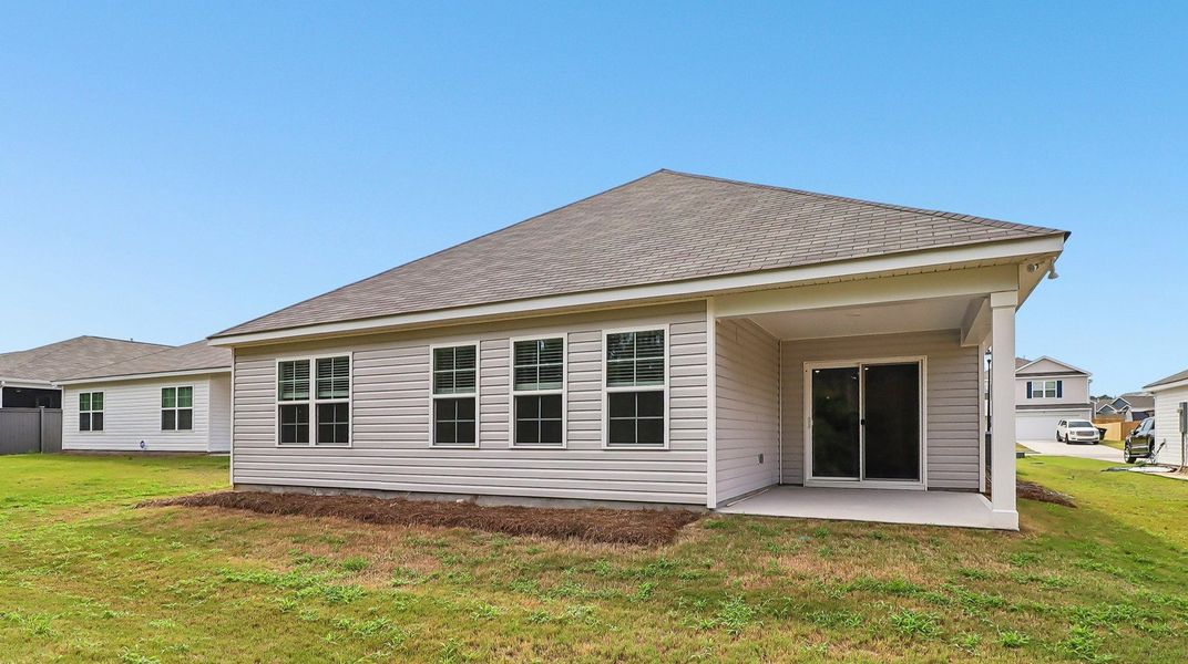 Exterior details and patio area of a home in Gates Village, Lugoff (Image 3).