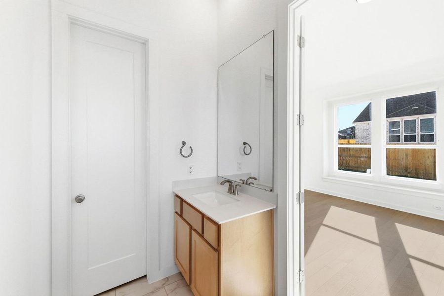 Furnished interior view inside a new home in 6 Creeks at Waterridge, Kyle (Image 11).