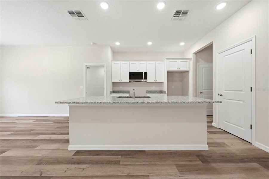 Furnished interior view inside a new home in , Astatula (Image 6).