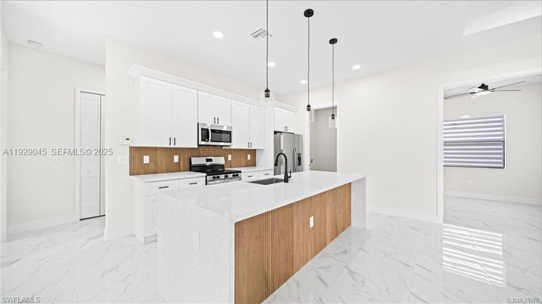 Furnished interior view inside a new home in , Lehigh Acres (Image 33). Furnished interior view inside a new home in , Lehigh Acres (Image 33).