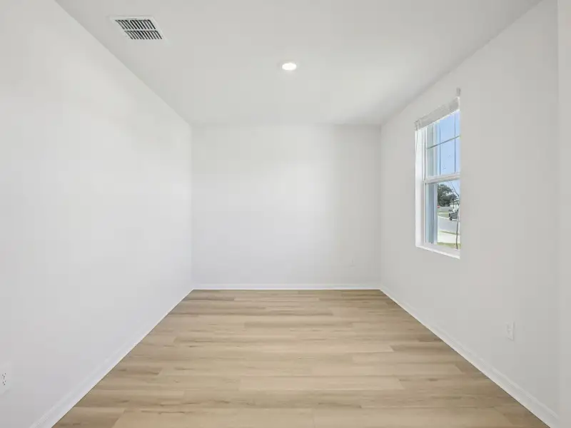 Spacious, unfurnished interior of a new home in Magnolia Bay - Classic Series, Nokomis (Image 15).