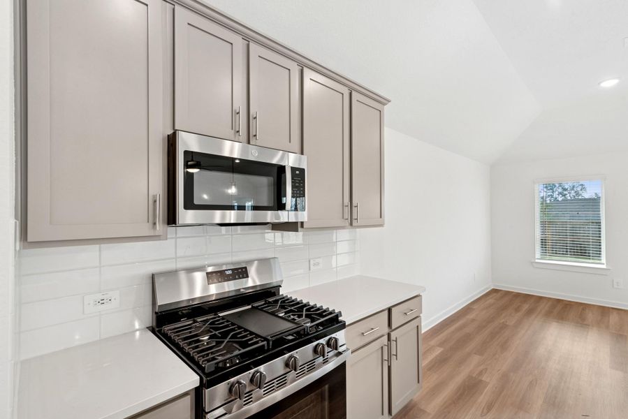 Furnished interior view inside a new home in Pinewood at Grand Texas, New Caney (Image 3).