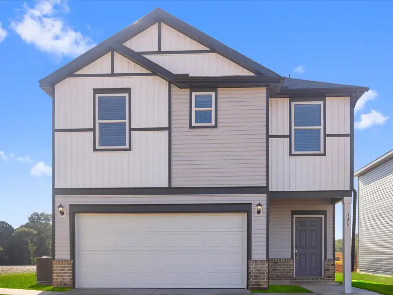 Front exterior of a new home in Pleasant Brook, Piedmont, SC, highlighting curb appeal (Image 1). Front exterior of a new home in Pleasant Brook, Piedmont, SC, highlighting curb appeal (Image 1).