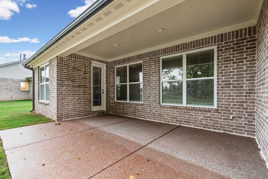 Exterior details and patio area of a home in Walker Farms, Bartlett (Image 2).