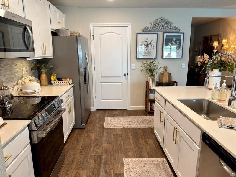 Furnished interior view inside a new home in Sawmill Branch Express, Palm Coast (Image 14).