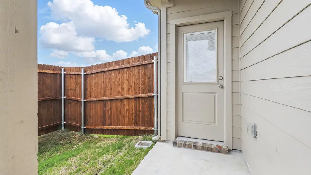 Exterior details and patio area of a home in Orchard Village, Fort Worth (Image 2). Exterior details and patio area of a home in Orchard Village, Fort Worth (Image 2).