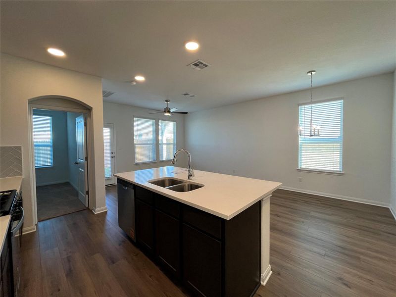 Large kitchen island. For demonstration purposes only. This will be the same interior layout. Colors can vary.
