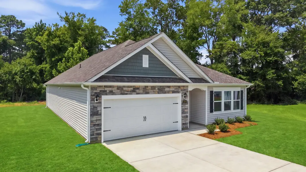 Front exterior of a new home in Villa Grande, Winterville, NC, highlighting curb appeal (Image 19).