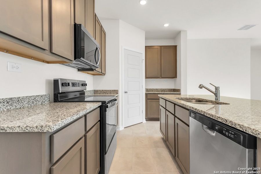 Furnished interior view inside a new home in Medina Crossing, Von Ormy (Image 3).