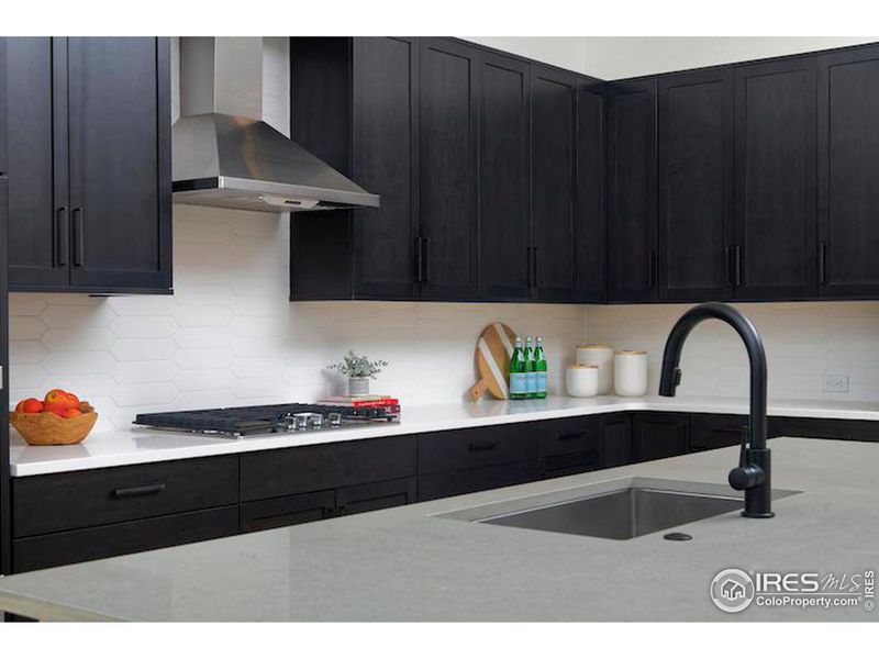 Large kitchen island with Kohler single bowl stainless steel sink