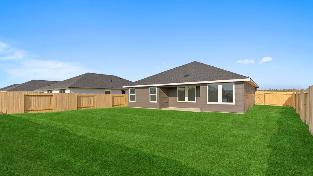 Exterior details and patio area of a home in Caldwell Crossing, Iowa Colony (Image 4). Exterior details and patio area of a home in Caldwell Crossing, Iowa Colony (Image 4).