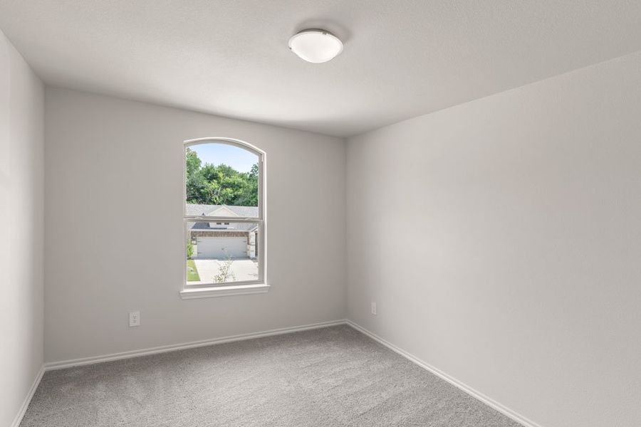Representative exterior photo of a completed home built from the Willow by Impression Homes in ValleyBrooke, Mesquite, TX (Image 15).