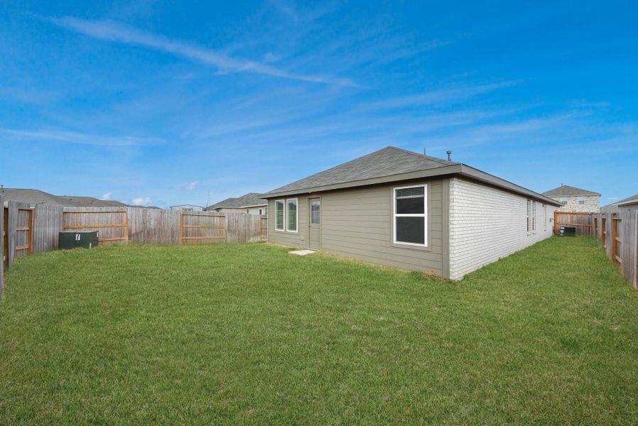 Exterior details and patio area of a home in , Katy (Image 4). Exterior details and patio area of a home in , Katy (Image 4).