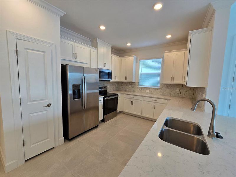 Furnished interior view inside a new home in The Cove at West Port, Port Charlotte (Image 6). Furnished interior view inside a new home in The Cove at West Port, Port Charlotte (Image 6).