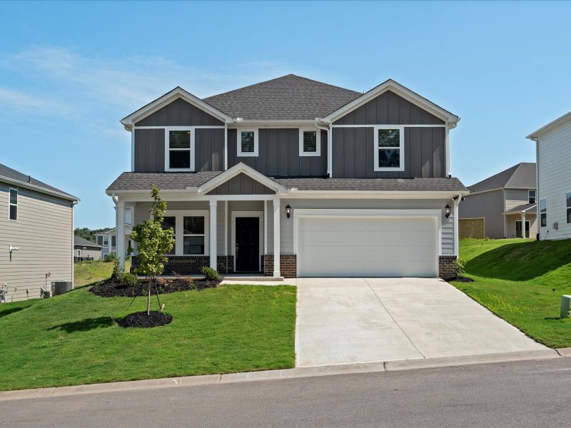 Front exterior of a new home in Chestnut Grove, Greer, SC, highlighting curb appeal (Image 1).