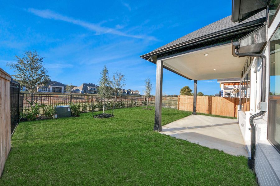 Exterior details and patio area of a home in Elyson, Katy (Image 4).