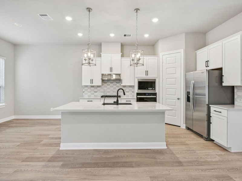 Furnished interior view inside a new home in Pinewood Trails - Luxe Series, Atascocita (Image 3).