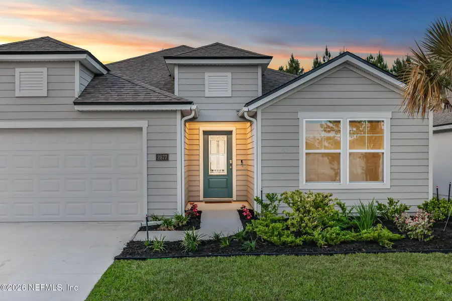 Front exterior of a new home in Cross Creek, Green Cove Springs, FL, highlighting curb appeal (Image 2).