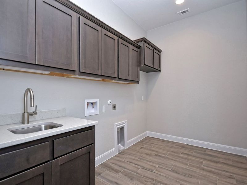 Representative furnished interior of a home built from the Siena III by Giddens Homes in Clearwater Ranch, Liberty Hill (Image 115).