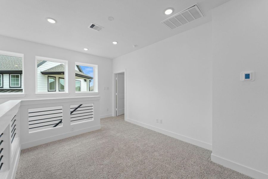Furnished interior view inside a new home in Meridiana, Iowa Colony (Image 7). Furnished interior view inside a new home in Meridiana, Iowa Colony (Image 7).